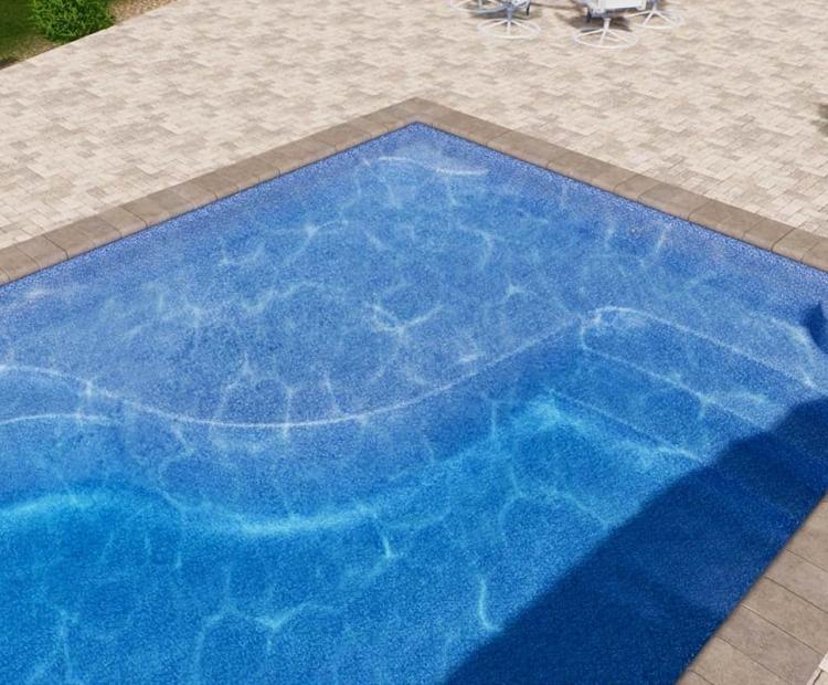 Aerial view of a fiberglass swimming pool and surrounding deck